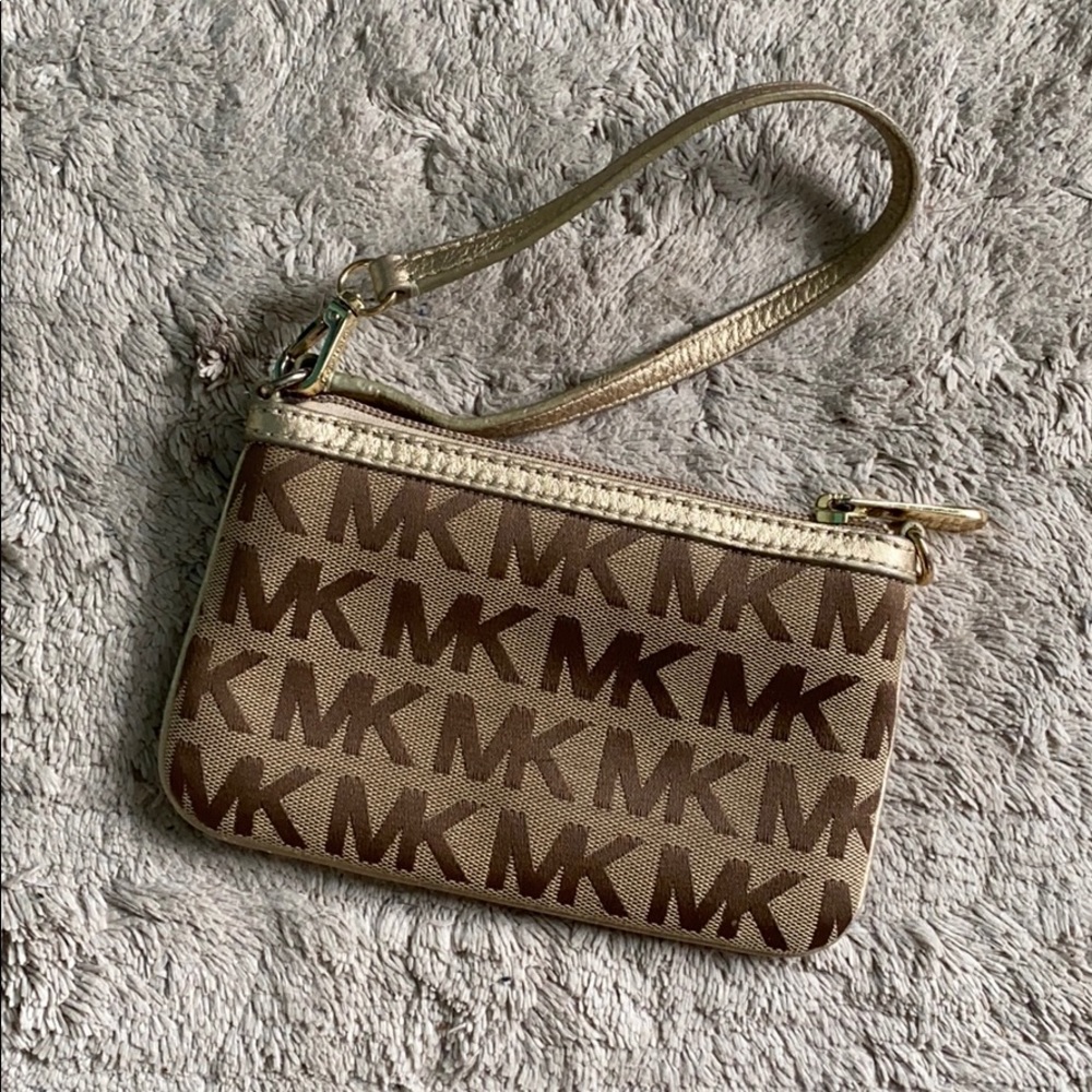 Michael Kors wristlet with gold trim